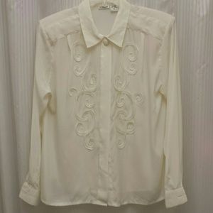Emboldened cream blouse